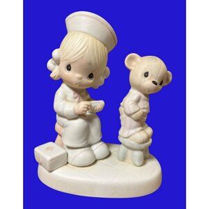 Precious Moments Love Beareth All Things Figurine E-7158 Nurse and Bear